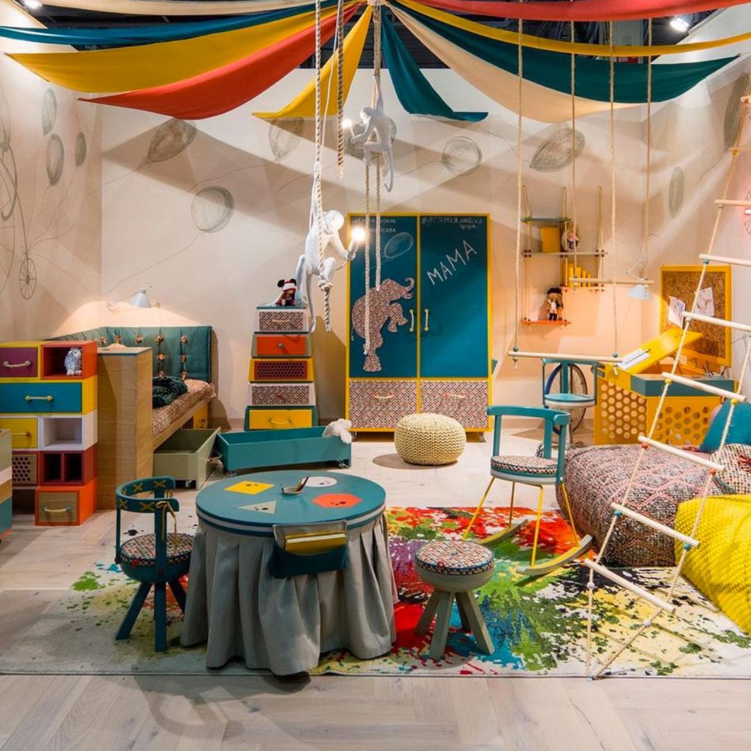 MAMA brand exhibition stand at BATIMAT 2019 with circus-themed children's furniture